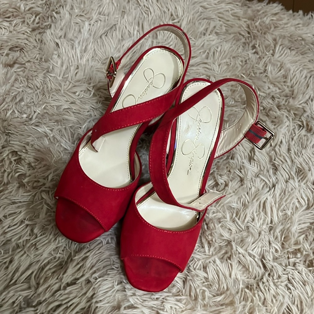 Red Jessica Simpson high heels.